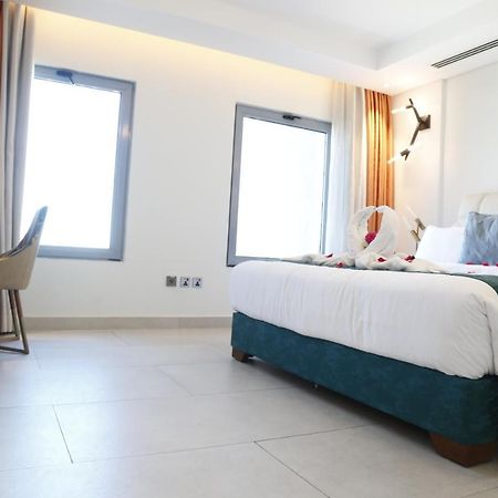 Lusail Waterfront Hotel Apartment מראה חיצוני תמונה A room at the hotel