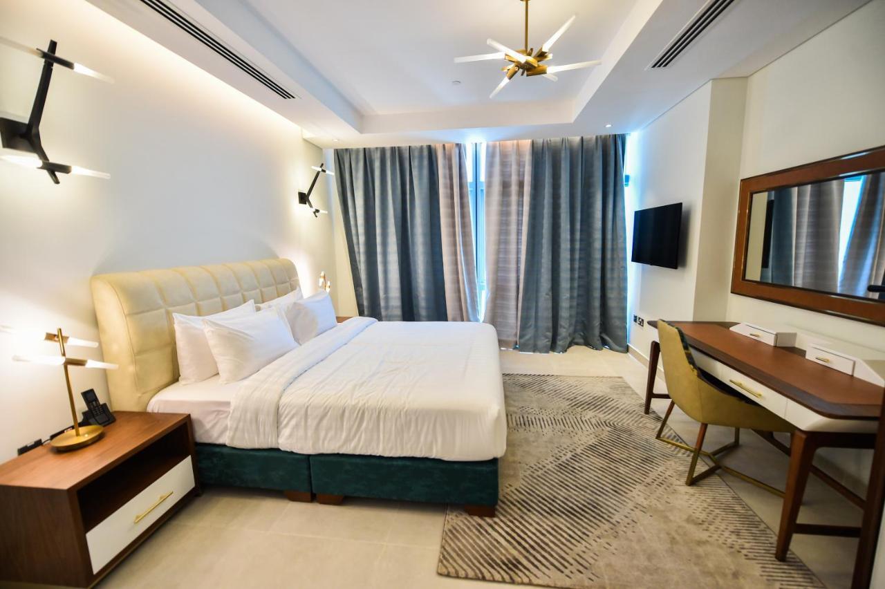Lusail Waterfront Hotel Apartment מראה חיצוני תמונה A bedroom at the hotel