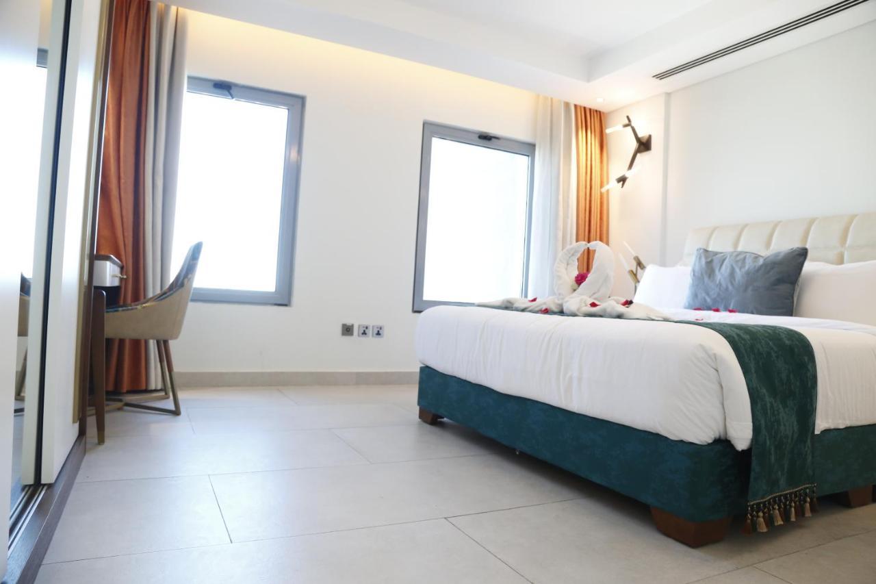 Lusail Waterfront Hotel Apartment מראה חיצוני תמונה A room at the hotel